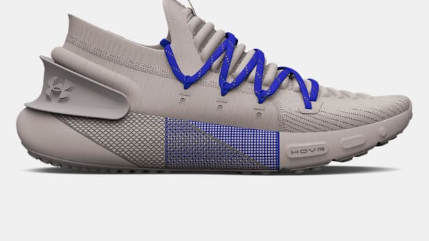 Grey and blue Under Armour running shoe.